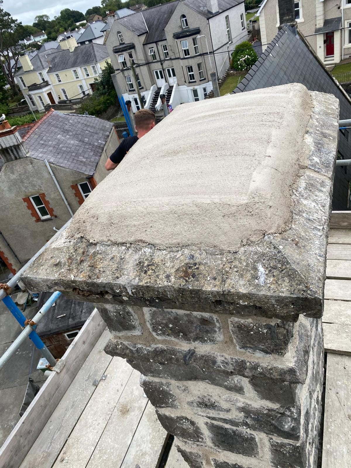 Heritage stone chimney stack restored with new lime flaunching