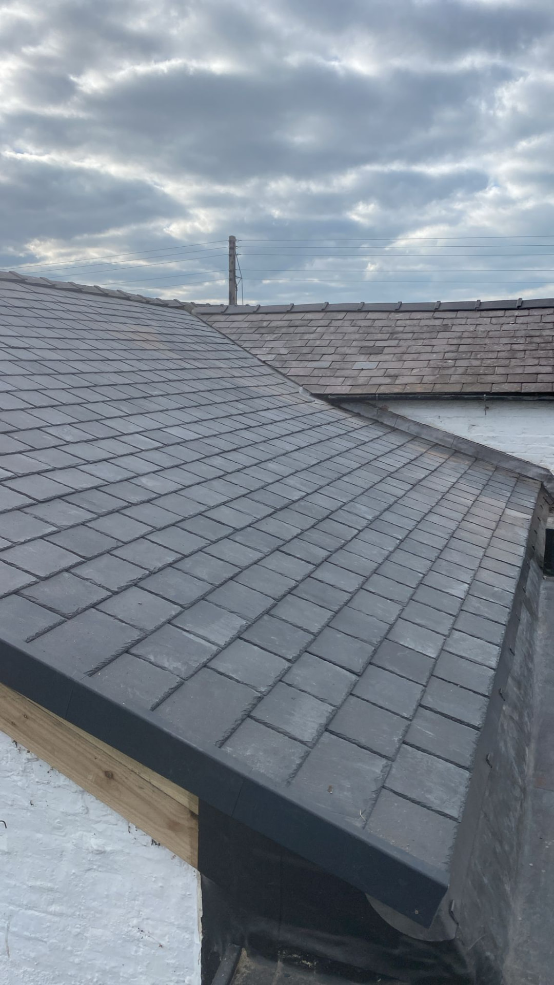 Reclaimed Welsh slate roof covering completed on a detached property