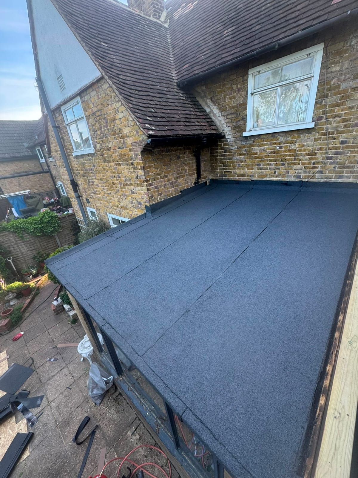 Modern flat roof system finished on a house extension in Anglesey